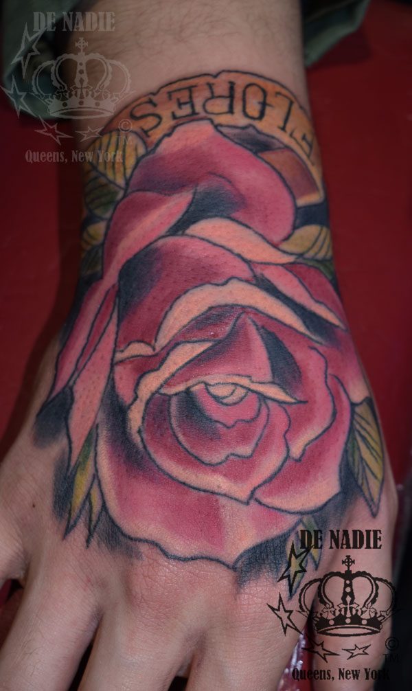 Rose tattoo on hand